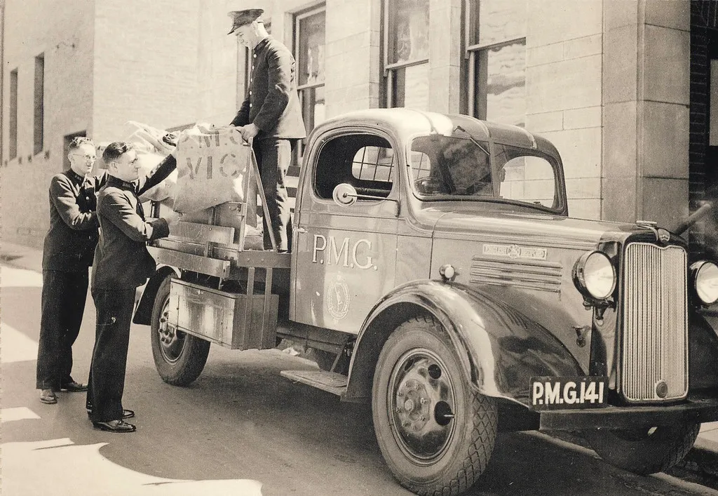 A delivery courier with parcels, representing a scheduled pickup
