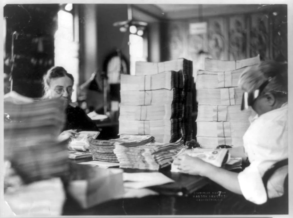 Stacked paper files, representing the customs paperwork that used to travel on the box