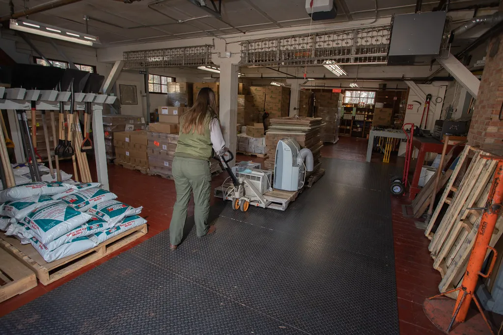 Pallets stacked in a distribution warehouse, representing 1P vendor operations
