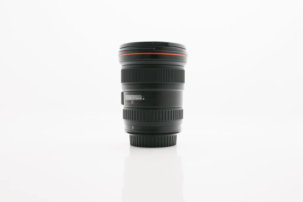 A camera lens, representing product photography as the input to listing generation